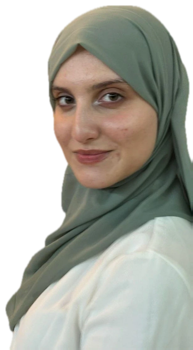 Yasmine Barkaoui smiling over her shoulder